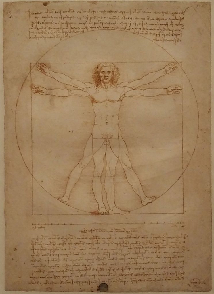 Dessin de Léonard de Vinci représentant l'Homme de Vitruve. L'homme se tient dans un cercle.
